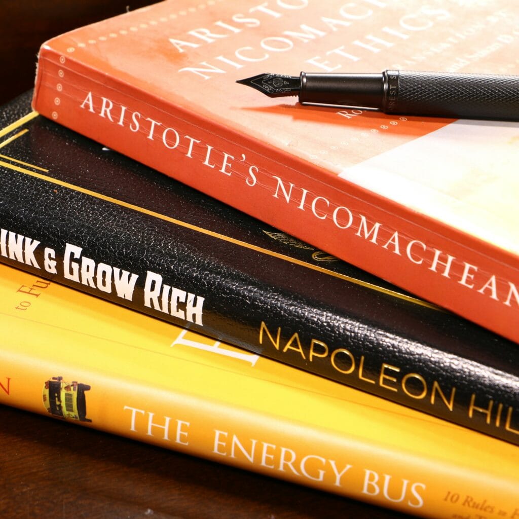 Notebook and pen on books for IBDP Math past papers article