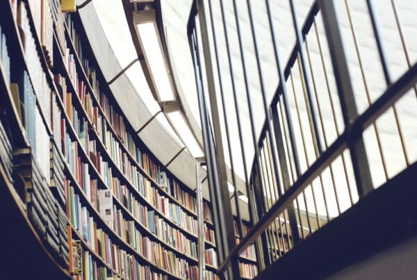 architectural library interior with bookshelves