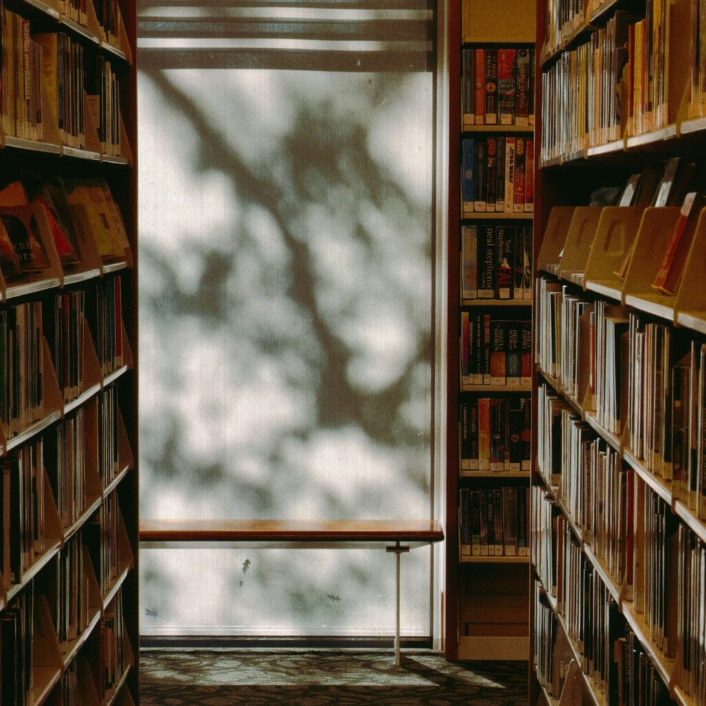 library aisle with bookshelves