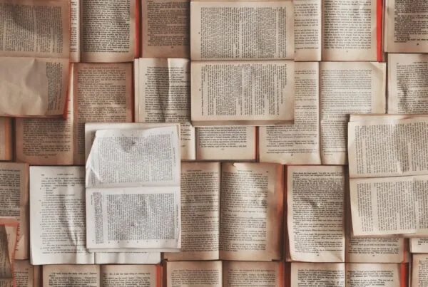 academic books arranged on a study shelf